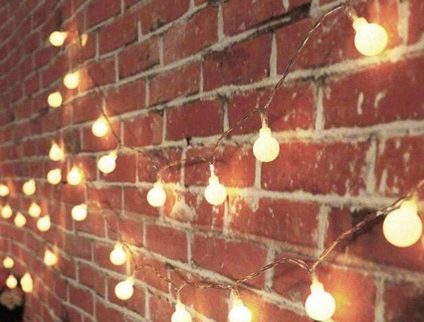 how to attach string lights to brick wall